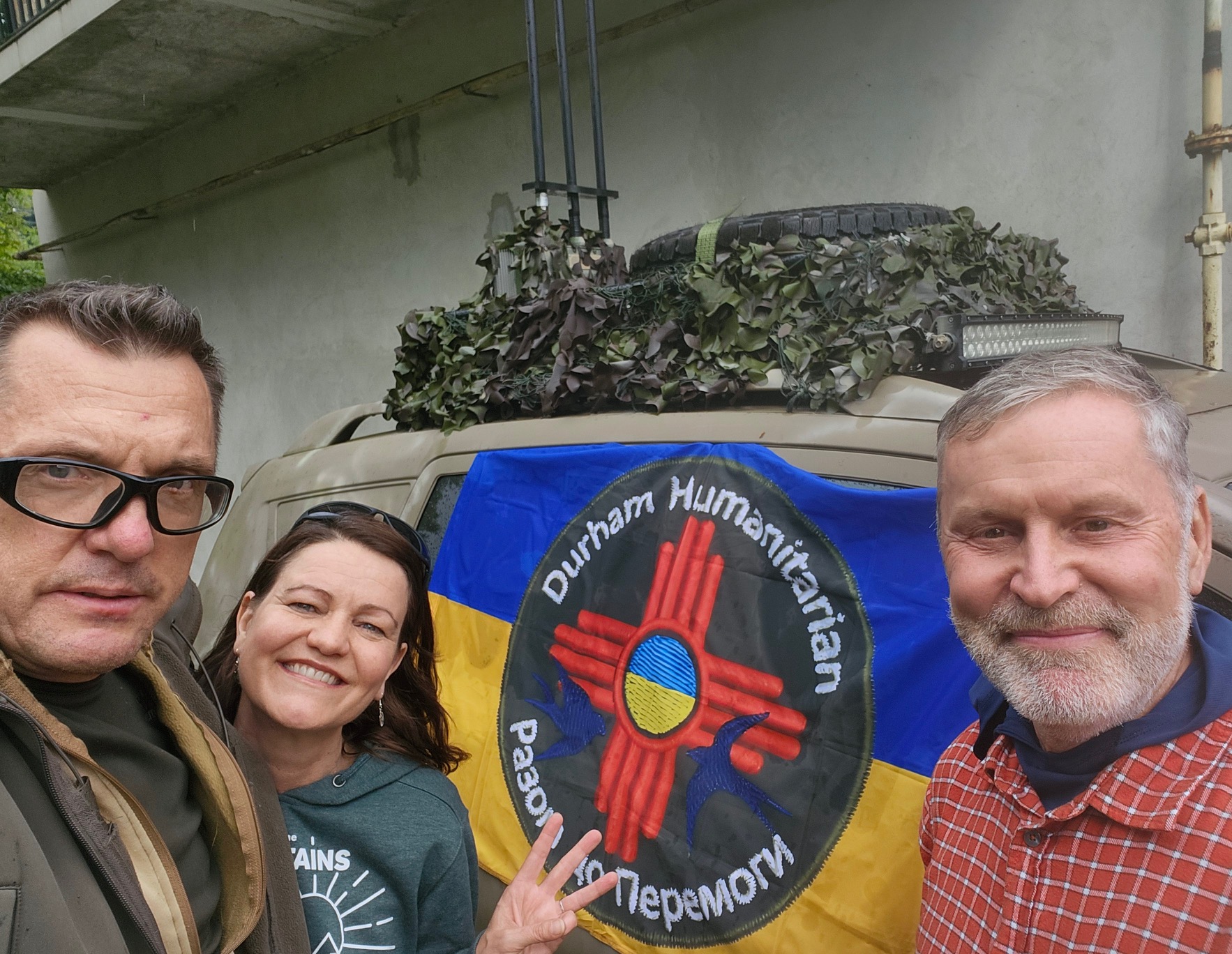 Rocky & team with Rotary flag