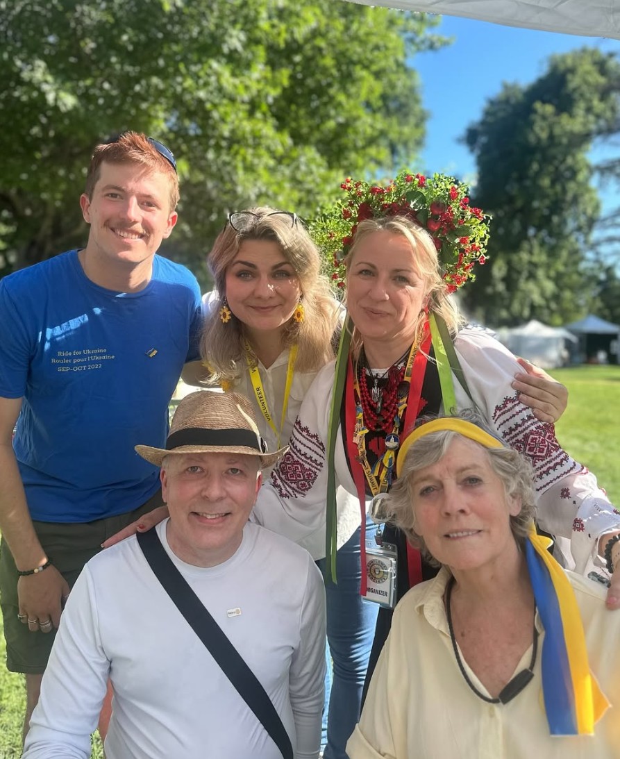 Co-founders Nancy Fischer and Ilya Podobedov with members of The Sunflower Society - Sacha, Anna, and Svitlana - at UC Davis Whole Earth Festival.