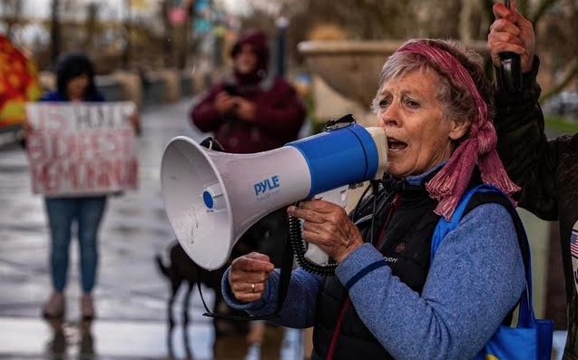 Nancy Fischer, co-founder of Yolo For Ukraine, speaking at the March Rally